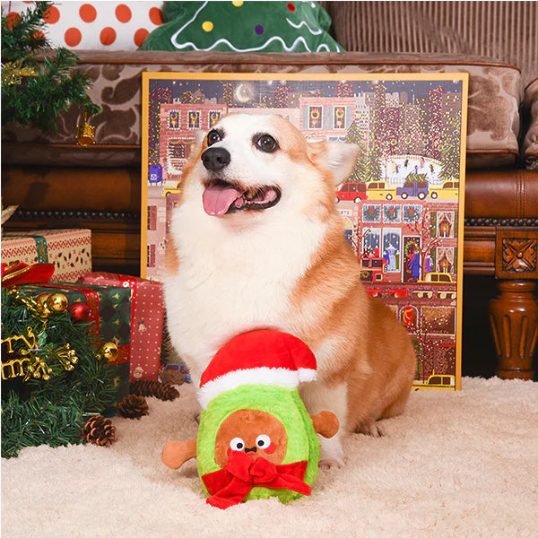 Hugsmart Happy Woofmas Santa Avocado plush dog toy being played with