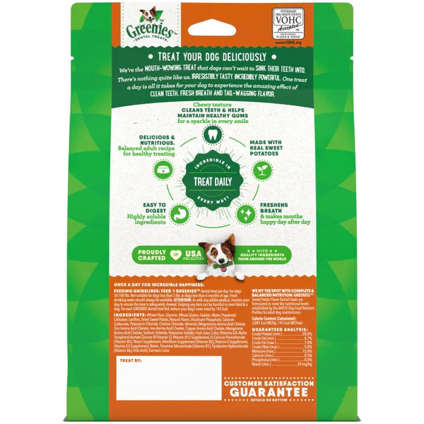 Dog chewing a Greenies Sweet Potato dental treat