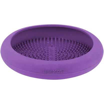 LickiMat UFO in turquoise mounted on a surface