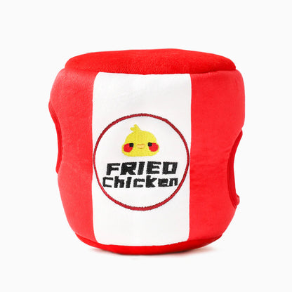 Close-up of the squeaky plush drumsticks from the Fried Chicken toy