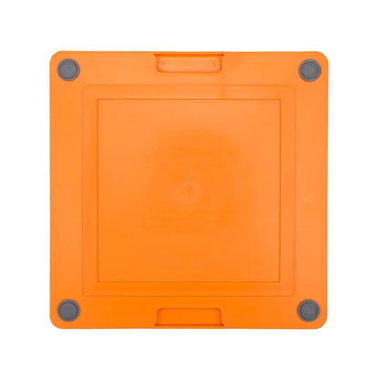 LickiMat Soother Tuff orange mat in use with a dog