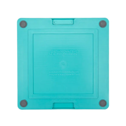 LickiMat Soother Tuff turquoise mat in use with a pet