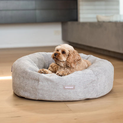 Snooza Panelled Cuddler dog bed in Pebble colour with dog resting inside