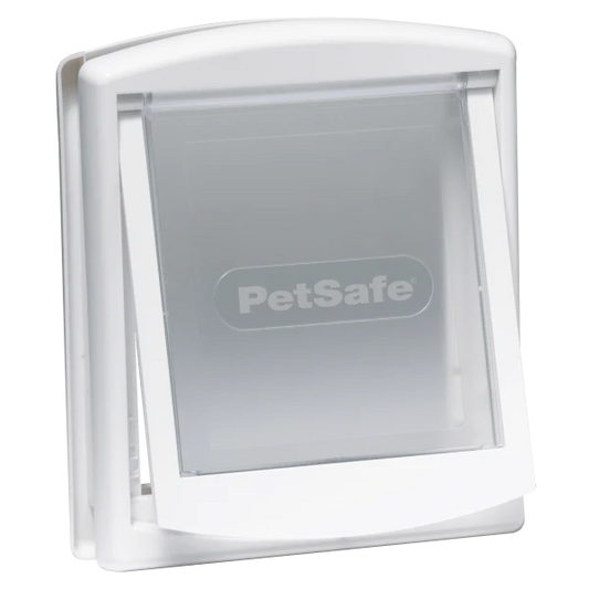 PetSafe Staywell Original 2-Way Pet Door fitted in a white door, hero shot
