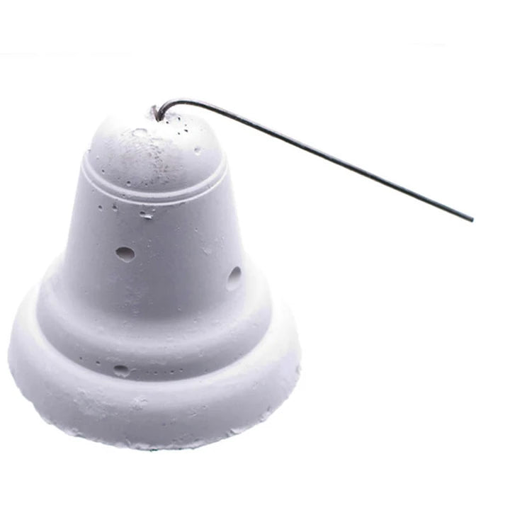 Probird Calcium & Charcoal Bell hanging in a bird cage