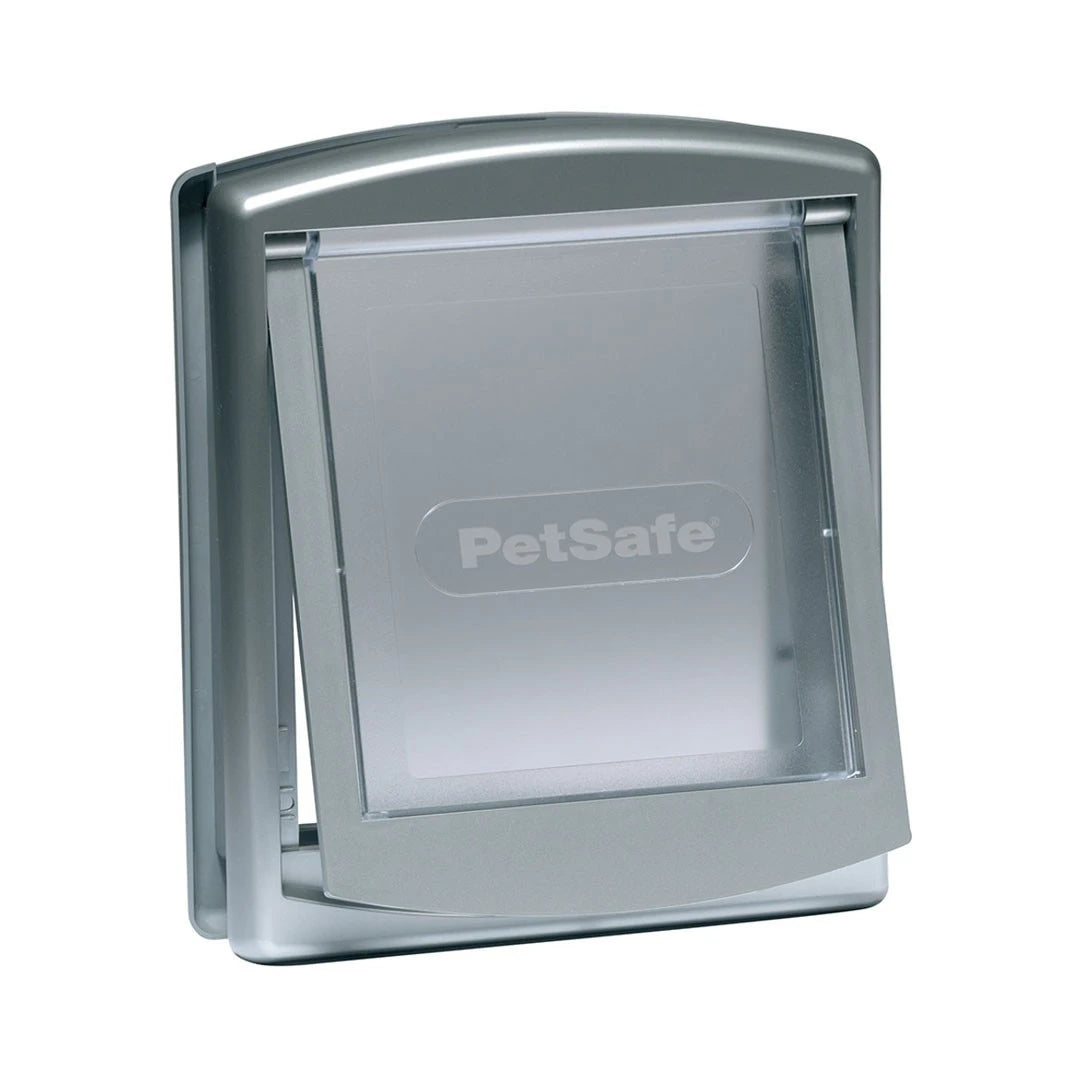 PetSafe Staywell 2-Way Pet Door installed in a brick wall