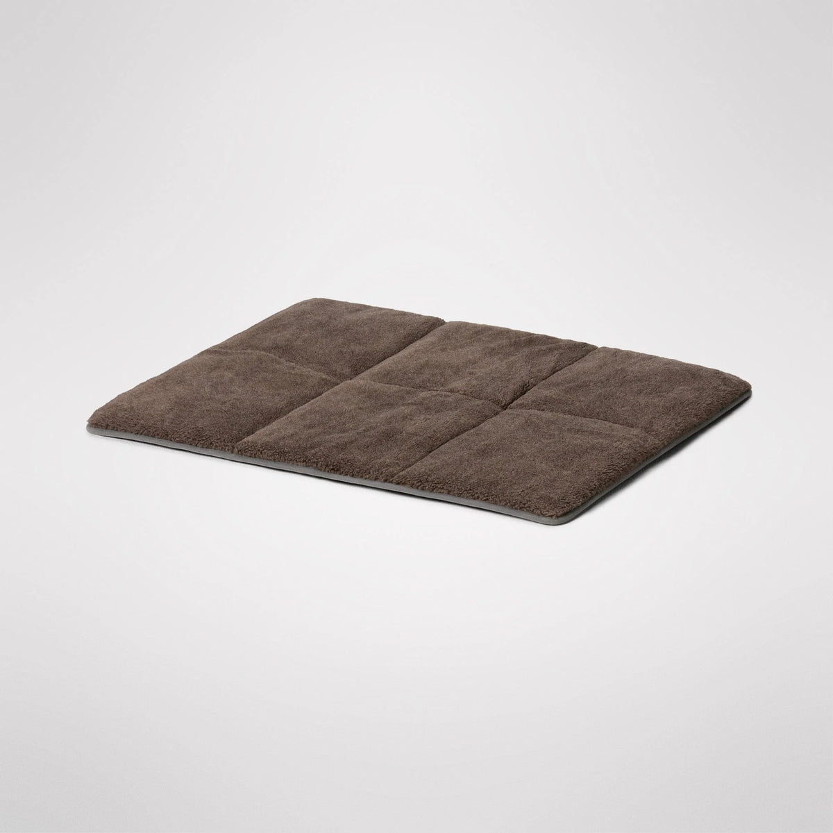 Travel Swag folded closed with its velcro fastening and cotton carry handles